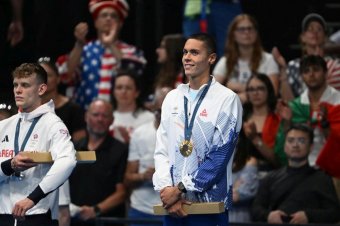 Ki tud jobban dicsérni? Egymást túllicitálva gratuláltak az állami vezetők David Popovicinak az aranyéremért