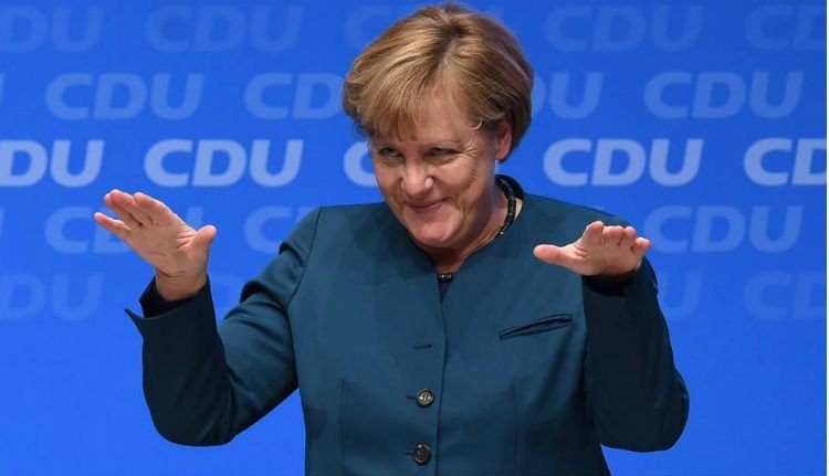 Újraválasztották Merkelt, aki szokatlanul keményen beszélt a migrációról