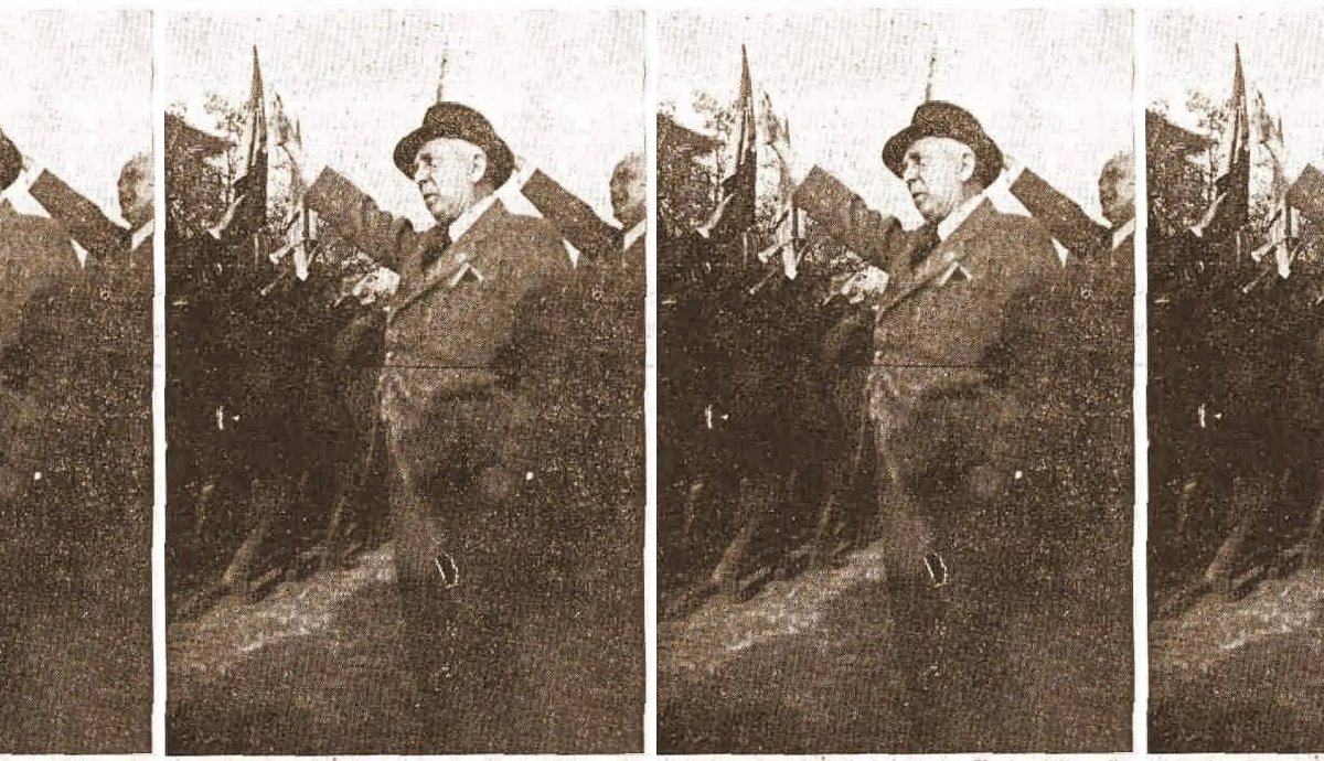 Korabeli sajtófotó: Octavian Goga karlendít egy kisjenői találkozón. 