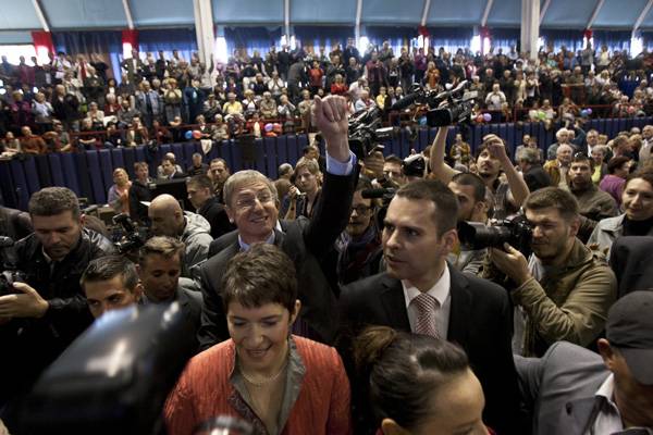 Molnár Csaba (előtérben) úgy tudja, tömegesen indultak haza románok Olaszországból &bullet;  Fotó: MTI