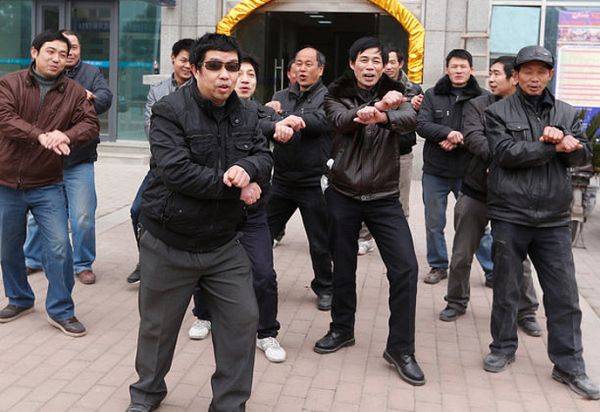 Gangnam Style-tánccal tüntetett elmaradt bére miatt félszáz munkás Kínában