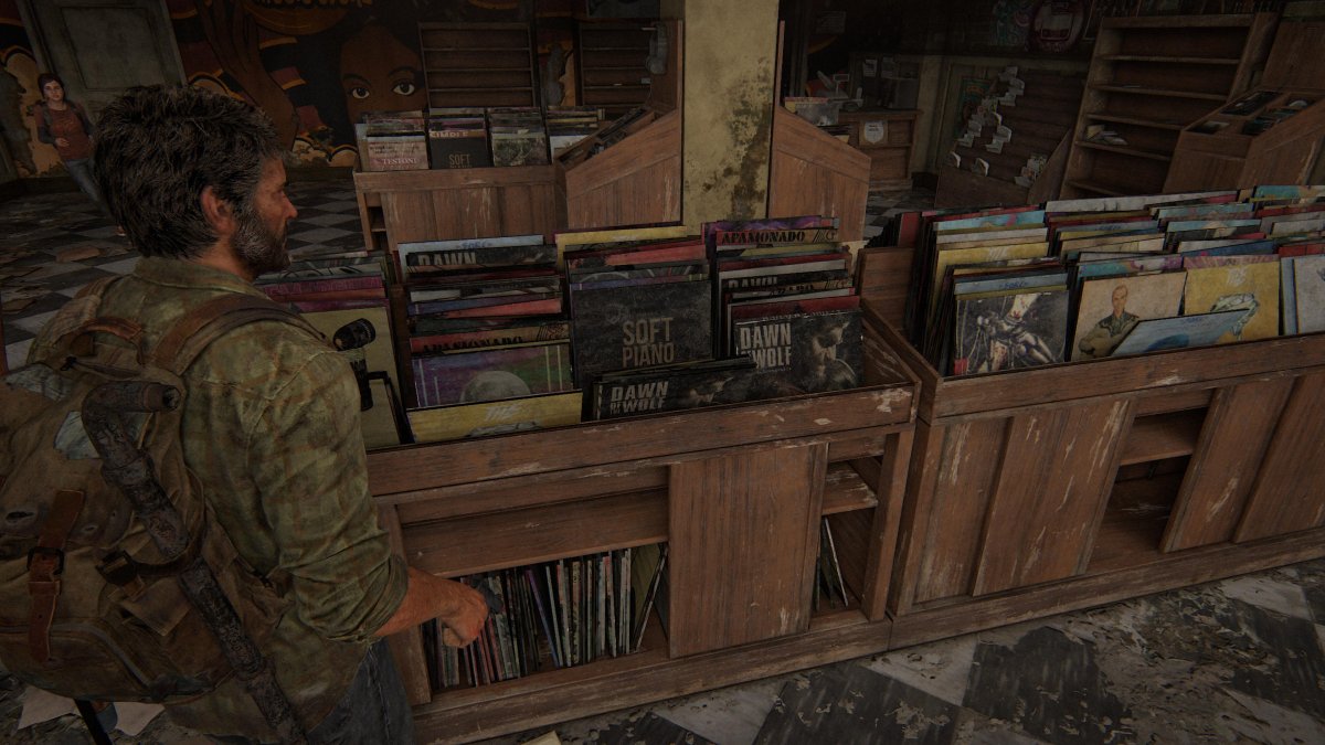 Joel és Ellie egy elhagyatott zeneboltban, ahol a készítők még a lemezek egyenkénti kidolgozására is figyeltek •  Fotó: The Last of Us/Képernyőfotó