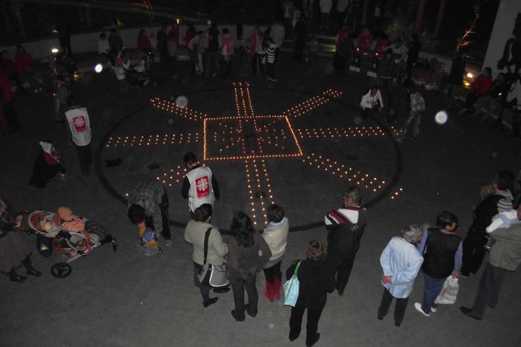 A láng jelkép, az adomány tett